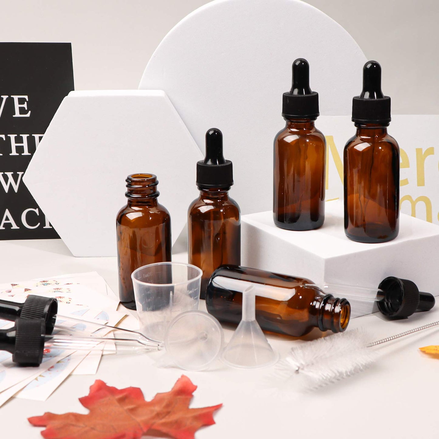 Comrzor 24 Pack 1oz Amber Glass Bottles with Glass Eye Droppers for Essential Oils, Perfumes (Brush, Funnels, 2 Extra Droppers, 36 Pieces Labels & 30ml Measuring Cup Included)