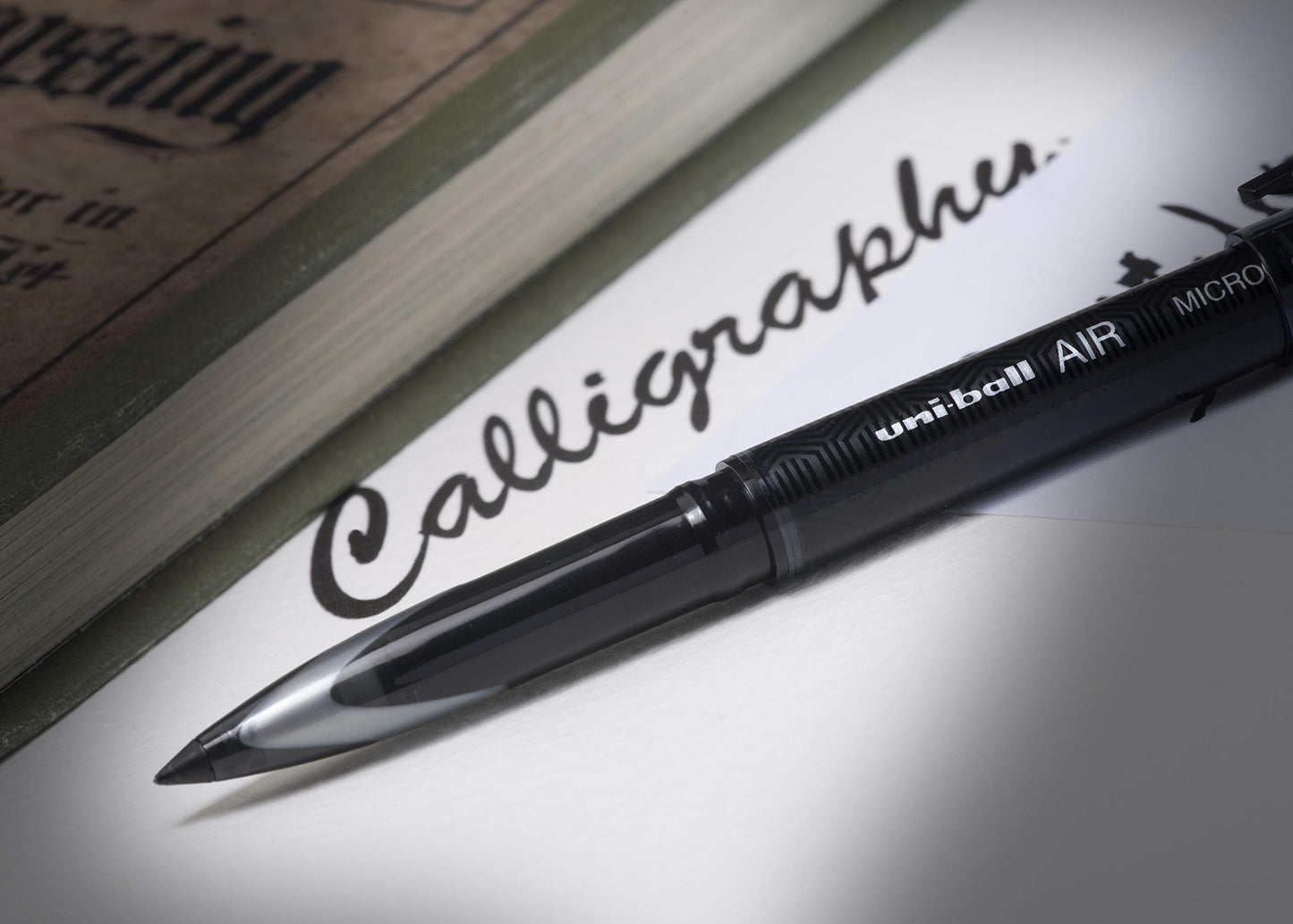 uni-ball UB-188-M Micro Air Rollerball Pens. Premium 0.5mm Nib for Super Smooth Handwriting. Writes Like a Fountain Pen. Fade and Water Resistant Liquid Uni Super Ink. Box of 12 Black Ballpoint Pens