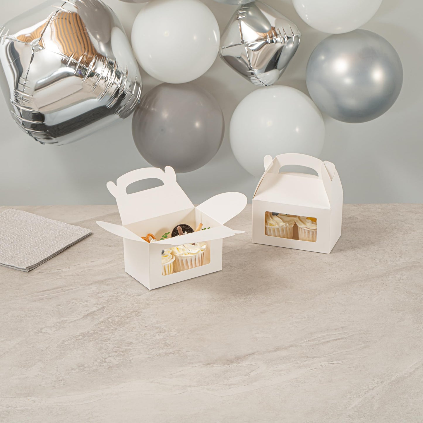 Restaurantware Gable Gift Boxes Pack of 100 Greaseproof Paper Treat Boxes 6 x 3.5 x 3.5 Inches With Window, Disposable Design White Containers for Weddings or Birthdays