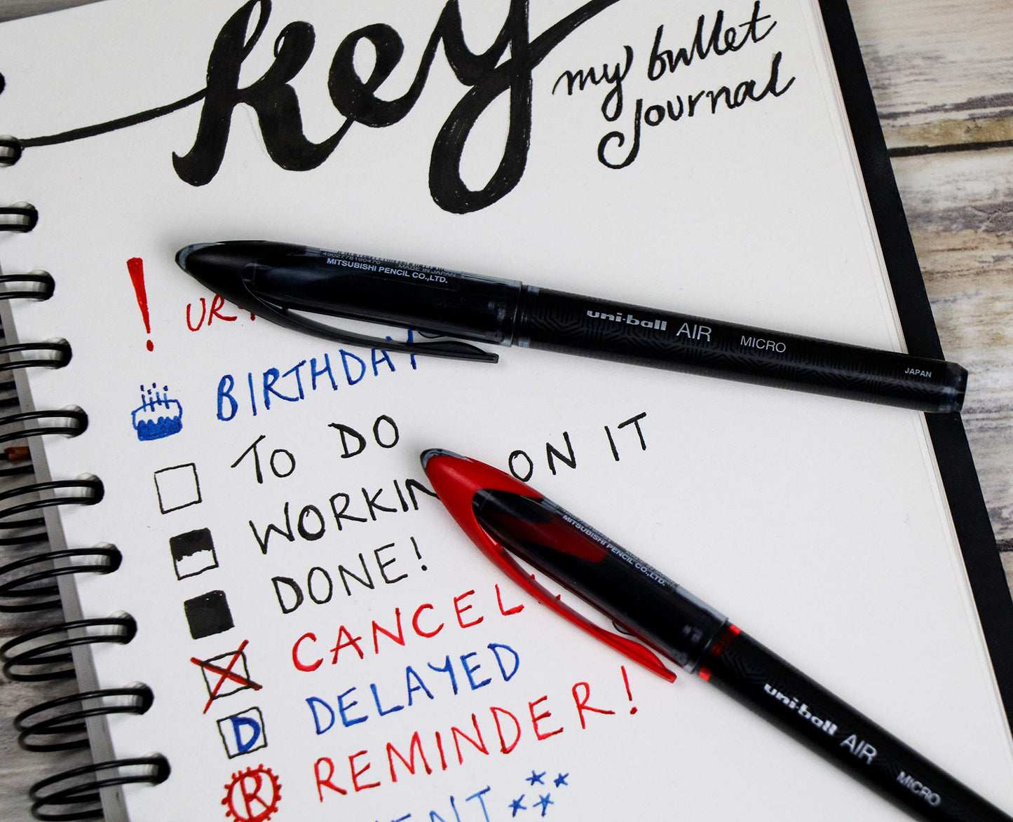 uni-ball UB-188-M Micro Air Rollerball Pens. Premium 0.5mm Nib for Super Smooth Handwriting. Writes Like a Fountain Pen. Fade and Water Resistant Liquid Uni Super Ink. Box of 12 Black Ballpoint Pens