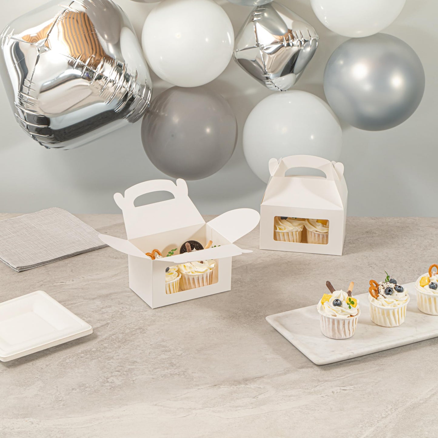 Restaurantware Gable Gift Boxes Pack of 100 Greaseproof Paper Treat Boxes 6 x 3.5 x 3.5 Inches With Window, Disposable Design White Containers for Weddings or Birthdays