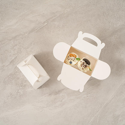 Restaurantware Gable Gift Boxes Pack of 100 Greaseproof Paper Treat Boxes 6 x 3.5 x 3.5 Inches With Window, Disposable Design White Containers for Weddings or Birthdays